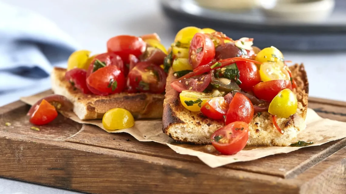 Close-up of a gourmet bruschetta dish served at a Landmark Group dining establishment.