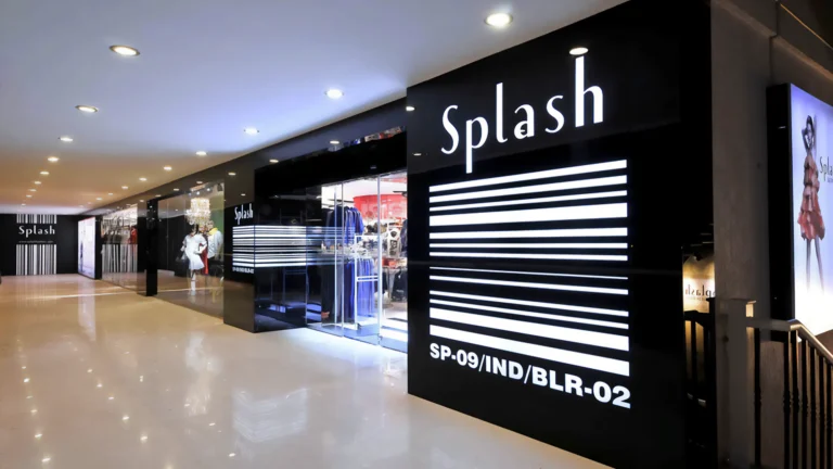 Exterior view of Splash store showcasing modern branding and design.