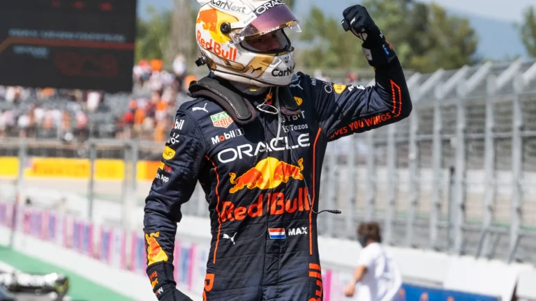 Red Bull Racing driver celebrating victory in a Formula 1 race.