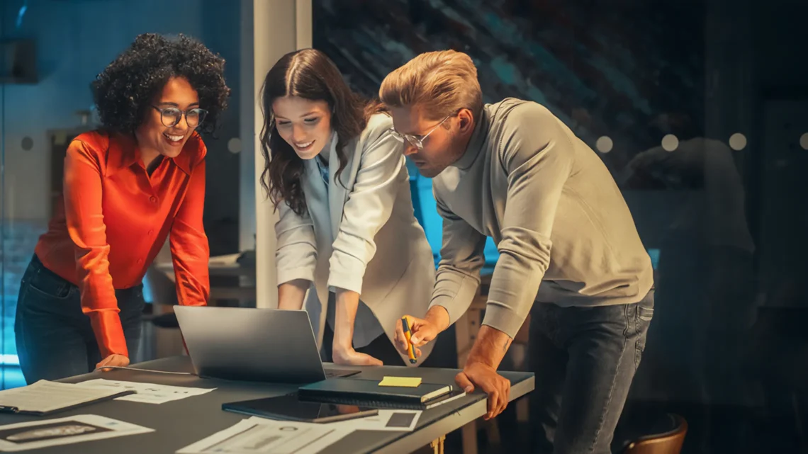 Team discussing Vodafone UK’s Ecommerce transformation plan in a collaborative session.