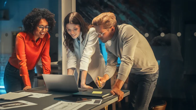 Team discussing Vodafone UK’s Ecommerce transformation plan in a collaborative session.